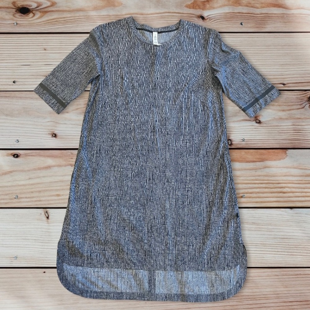 Lululemon dress w open back, size 4. Excellent used condition.